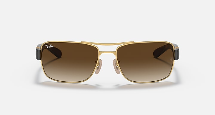 Brown gradient-lens sunglasses with gold frame and small square front, front view.