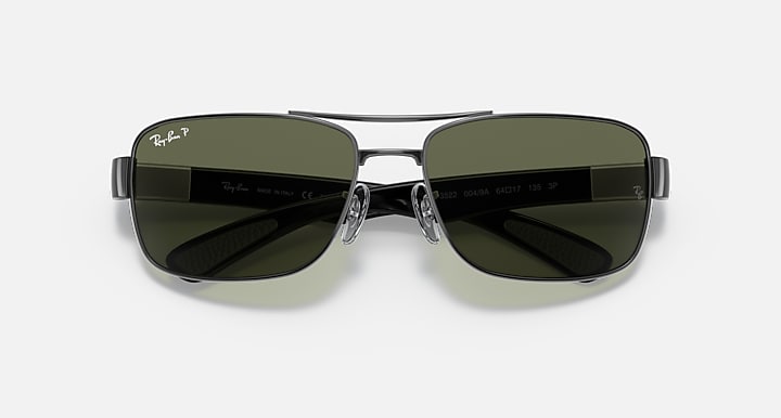 Ray-Ban RB3522 sunglasses with gunmetal frame and dark green tinted lenses