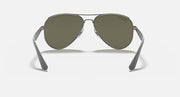 Aviator sunglasses front view with dark green lenses and slim silver temples