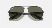 Aviator sunglasses with dark green gradient lenses and metal frame bridge detail