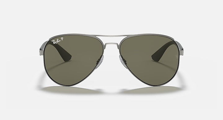 Aviator sunglasses with matte silver frame and dark green polarized lenses, front view