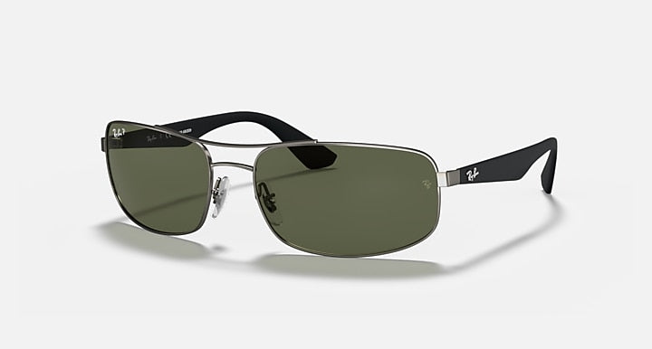 Ray-Ban RB3527 sunglasses with dark green lenses and black metal frame
