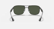 Ray-Ban RB3533 sunglasses with dark green lenses and clear metal frame