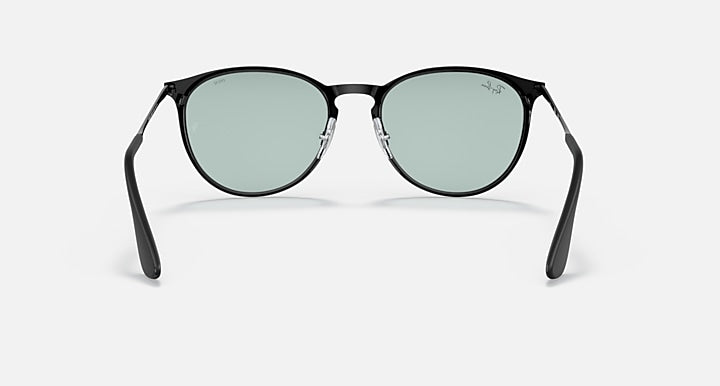Black metal round sunglasses with pale mint lenses and low-profile nose bridge