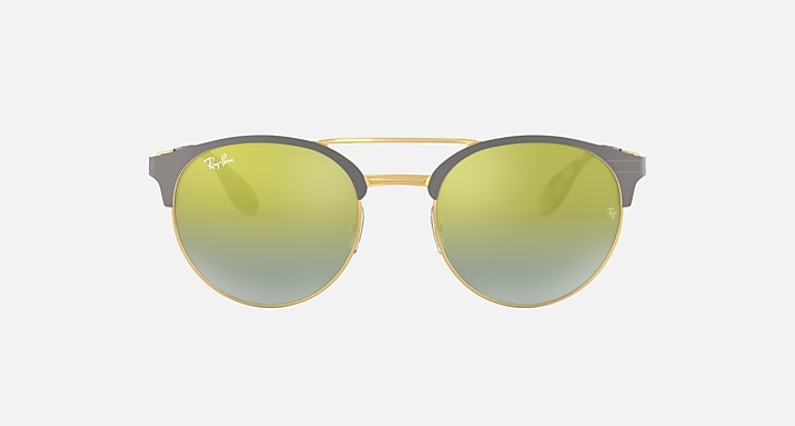 Ray-Ban RB3545 round sunglasses with gold-tone frame and green mirrored lenses