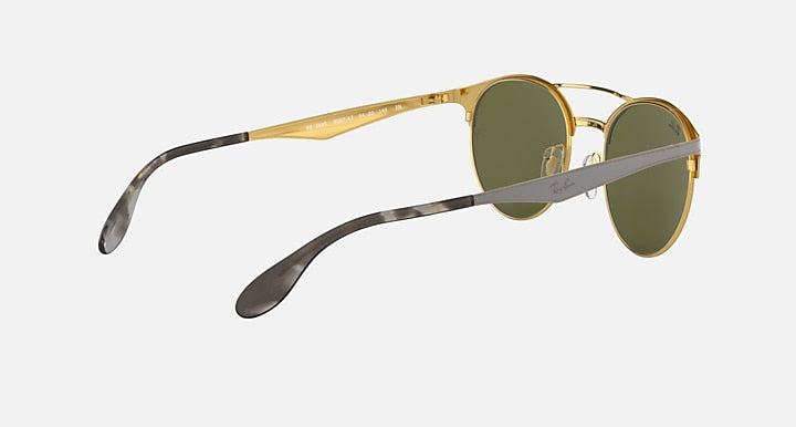 Ray-Ban RB3545 round sunglasses with gold-tone frame and green mirrored lenses