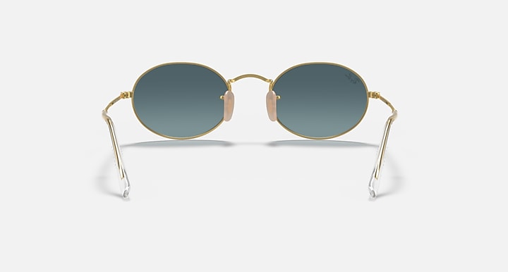 Gold round sunglasses with blue lenses and open bridge, front view