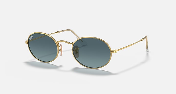 Gold round sunglasses with teal-tinted lenses, front view