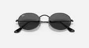 Ray-Ban round sunglasses with dark lenses and black metal frame, angled front view