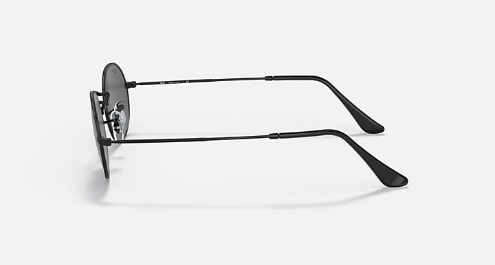 Ray-Ban round sunglasses with dark lenses and black metal frame, temple side view
