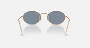 Ray-Ban round sunglasses with blue-gray lenses and rose gold metal frame, symmetrical front