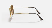 Ray-Ban hexagonal flat sunglasses side view with gold frame and tortoise-pattern temples