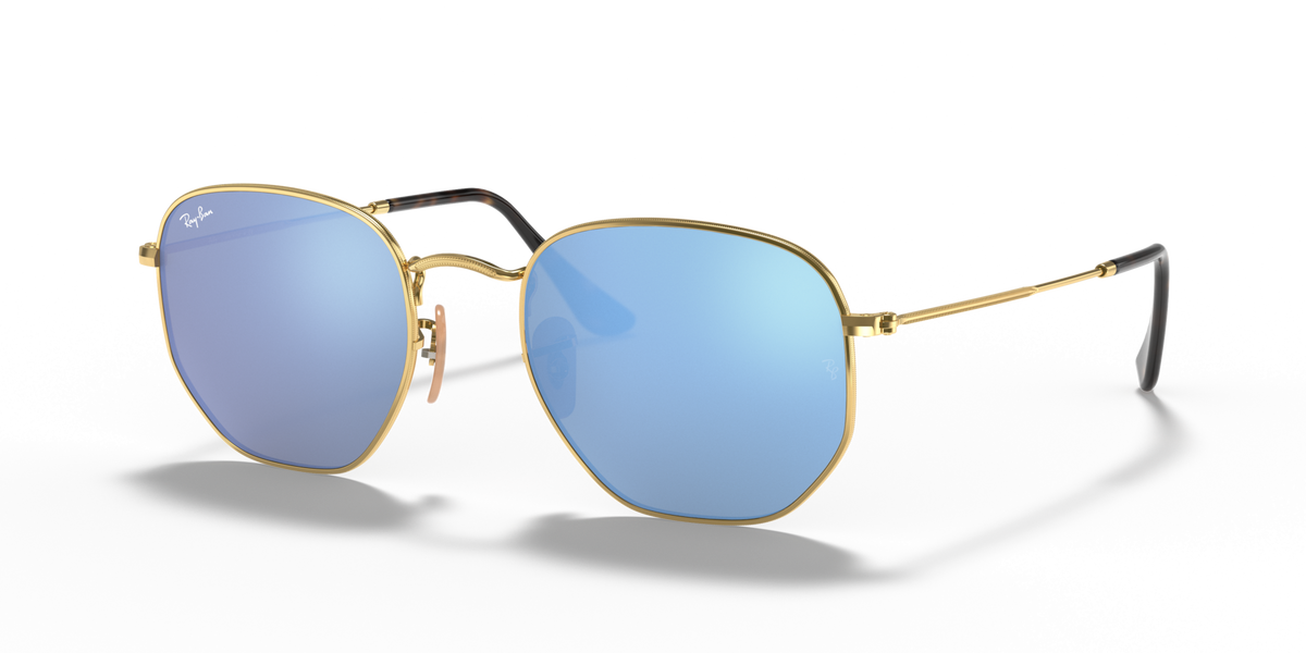 Ray-Ban hexagonal flat sunglasses with gold frame and blue tinted lenses