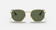 Hexagonal flat sunglasses with gold frame and dark green tinted lenses, front view