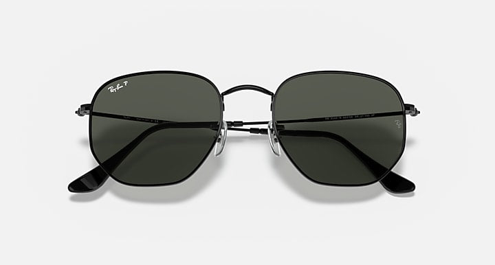 Ray-Ban hexagonal flat sunglasses with dark lenses and black frame, hinge detail