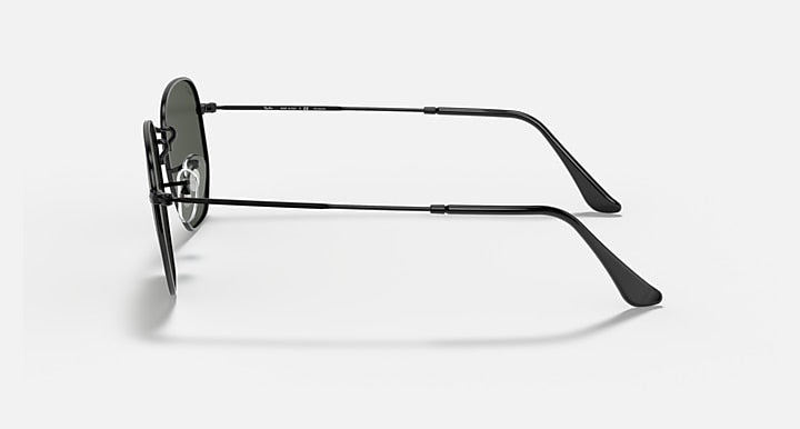Ray-Ban hexagonal flat sunglasses, side view, black metal frame with dark lenses