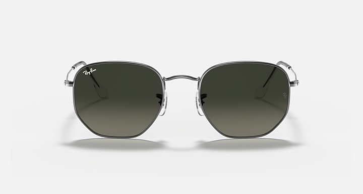 Ray-Ban hexagonal sunglasses with silver frame and olive-green lenses