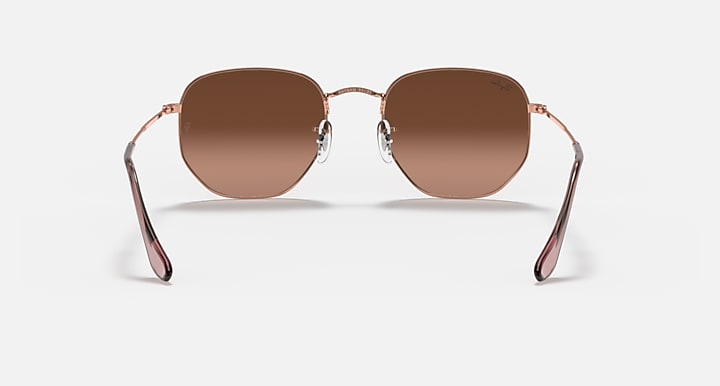 Ray-Ban hexagonal flat-lens sunglasses with brown lenses and slim rose-gold frame