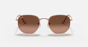 Ray-Ban hexagonal sunglasses with rose-gold frame and dark brown lenses