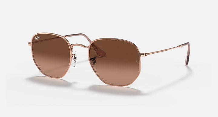 Ray-Ban hexagonal sunglasses with gold frame and brown gradient lenses