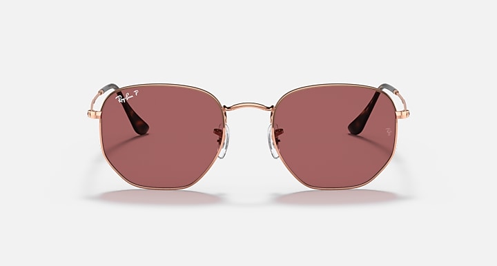 Rose gold hexagonal flat sunglasses with rose-tinted lenses and centered metal bridge