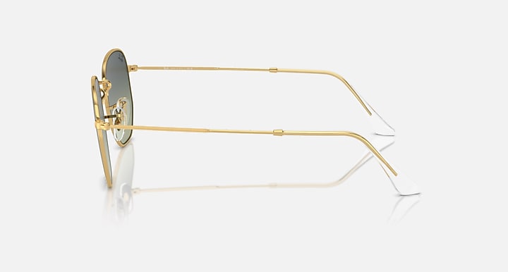 Ray-Ban hexagonal sunglasses side view with gold frame and clear temple tips