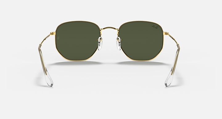 Ray-Ban hexagonal sunglasses with gold frame and dark green lenses