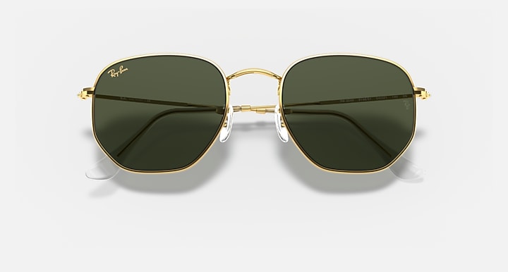 Ray-Ban hexagonal sunglasses with gold frame and dark green gradient lenses