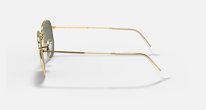 Ray-Ban hexagonal sunglasses side view with gold frame and clear lens