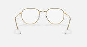 Ray-Ban hexagonal sunglasses with gold frame and clear lenses