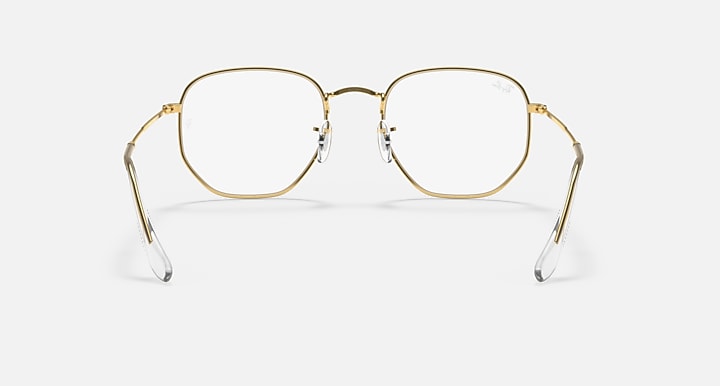 Ray-Ban hexagonal sunglasses with gold frame and clear lenses