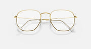 Ray-Ban hexagonal sunglasses with gold metal frame and clear lenses