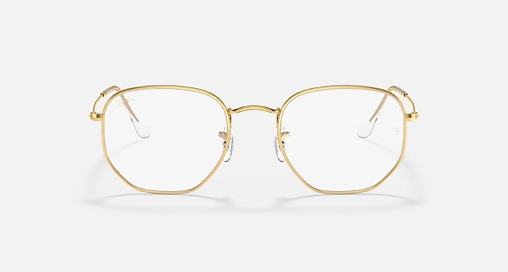 Ray-Ban hexagonal frame with gold metal and clear lenses, front view