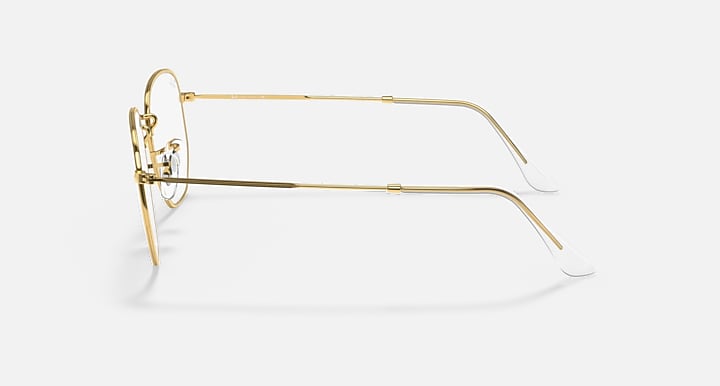 Ray-Ban hexagonal frame side view with gold metal and clear lenses