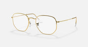 Ray-Ban hexagonal frame with gold metal and clear lenses