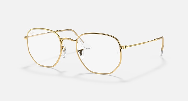 Ray-Ban hexagonal frame with gold metal and clear lenses