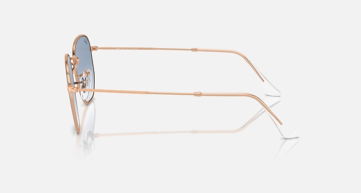 Ray-Ban hexagonal sunglasses side view with rose-gold frame and blue lenses