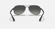 Ray-Ban aviator sunglasses with black frame and dark gray tinted lenses
