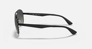 Aviator sunglasses with matte black frame and dark gray lenses, side view