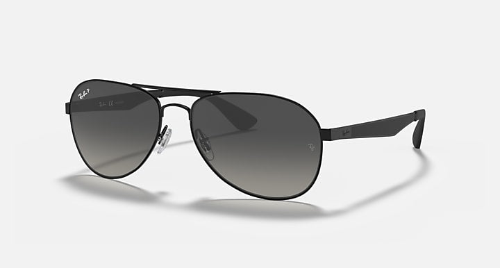 Ray-Ban aviator sunglasses with matte black frame and dark gray tinted lenses
