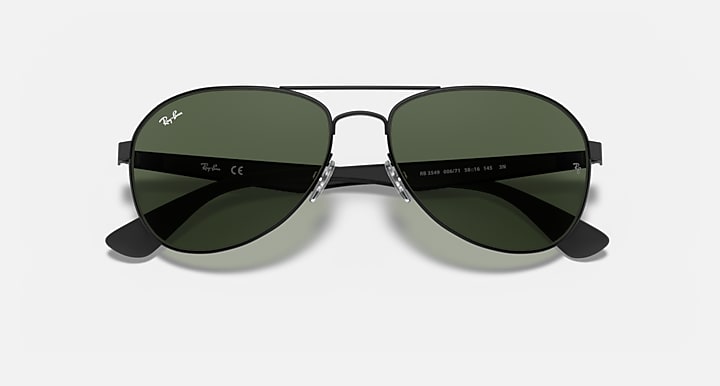 Ray-Ban aviator sunglasses with black frame and dark green gradient lenses, front view