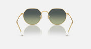 Ray-Ban round sunglasses with gold frame and muted green gradient lenses