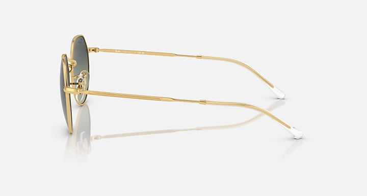 Ray-Ban round sunglasses, side view, gold frame with dark gradient lenses