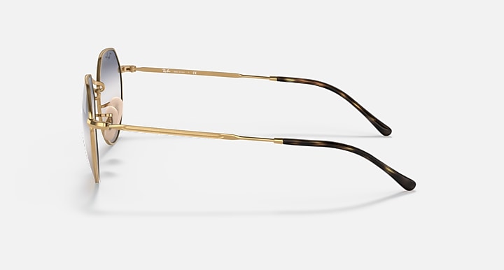 Round metal sunglasses side view with gold frame and dark patterned temples