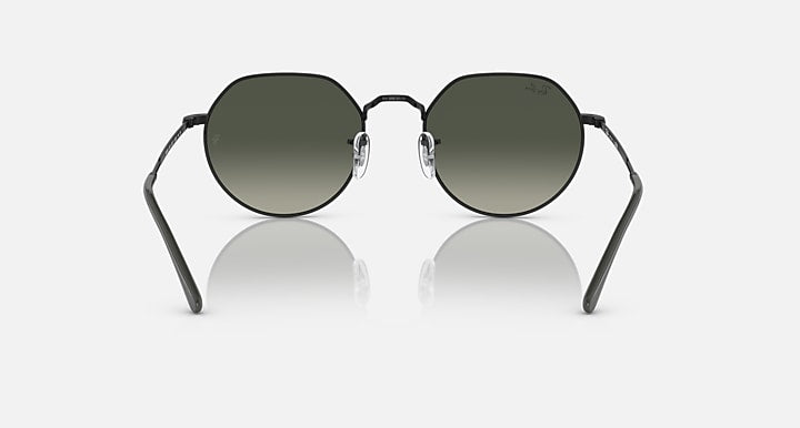 Ray-Ban RB3565 Jack sunglasses with dark green lenses and black round frames, straight on