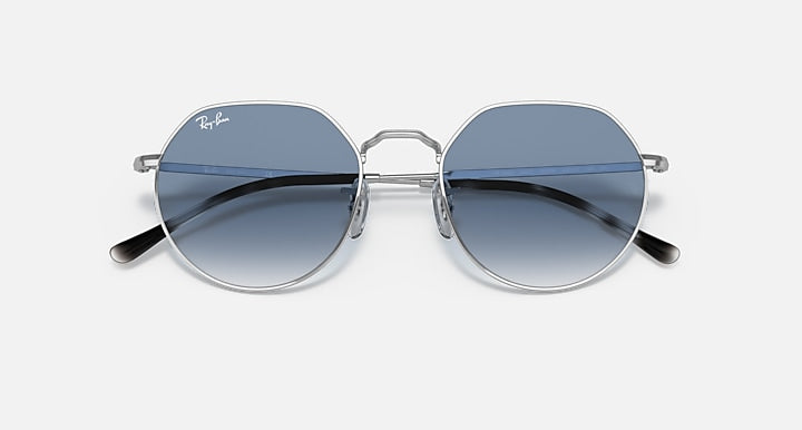 Round sunglasses with silver frame and blue lenses with darker lower tint