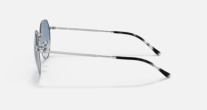 Round sunglasses side profile with silver frame and blue-tinted lenses