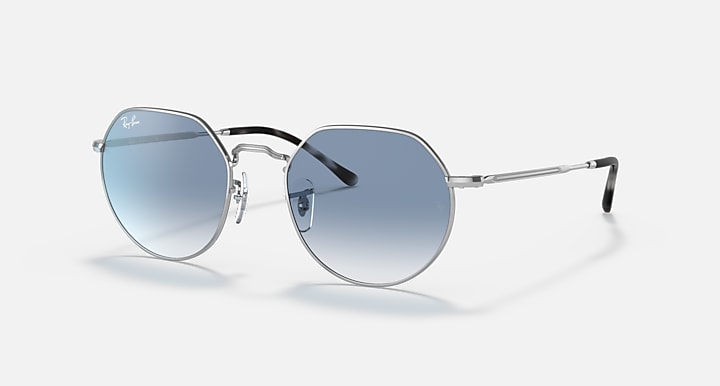 Round sunglasses with silver frame and light blue gradient lenses, front view