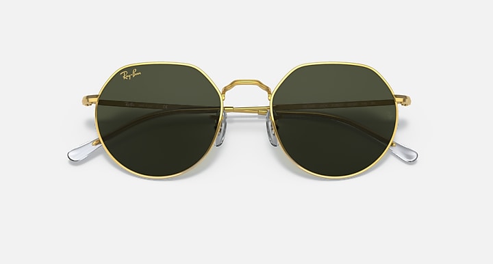 Round metal sunglasses with gold frame and dark gray tinted lenses