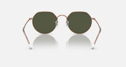 Round sunglasses with rose gold frame and dark olive tinted lenses, front view
